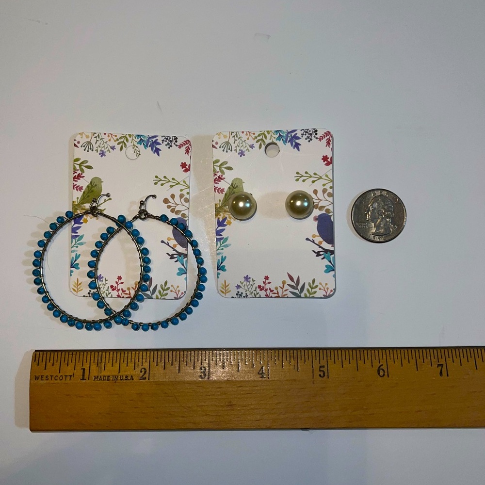 2 pair of pierceearrings. 2” diameter Turquoise hoops and 1/2” diameter pearls.